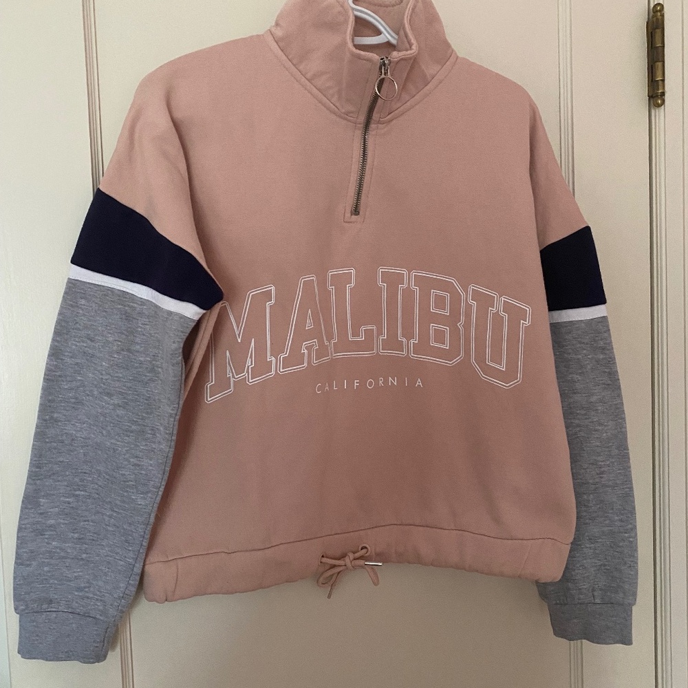 Pink quarter zip and colour block grey, white and blue sleeves, size S